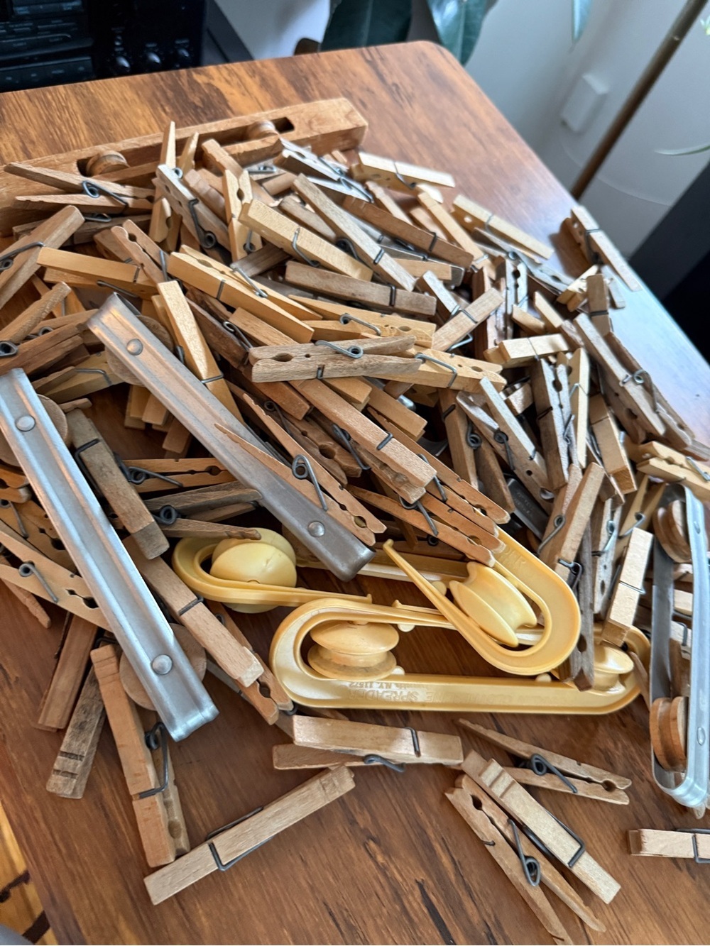 Lot of vintage Wooden Clothespins & Yellow Plastic Hangers